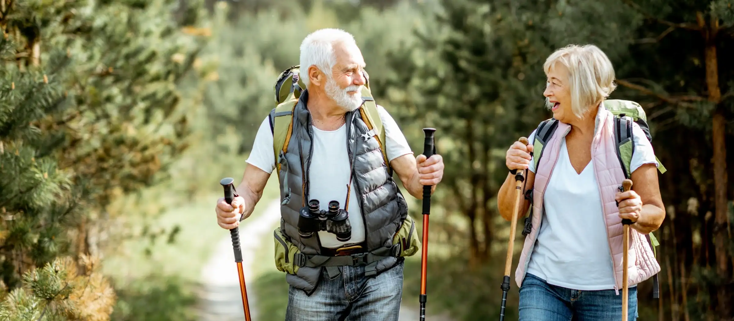 seniors hiking in nature with great vision